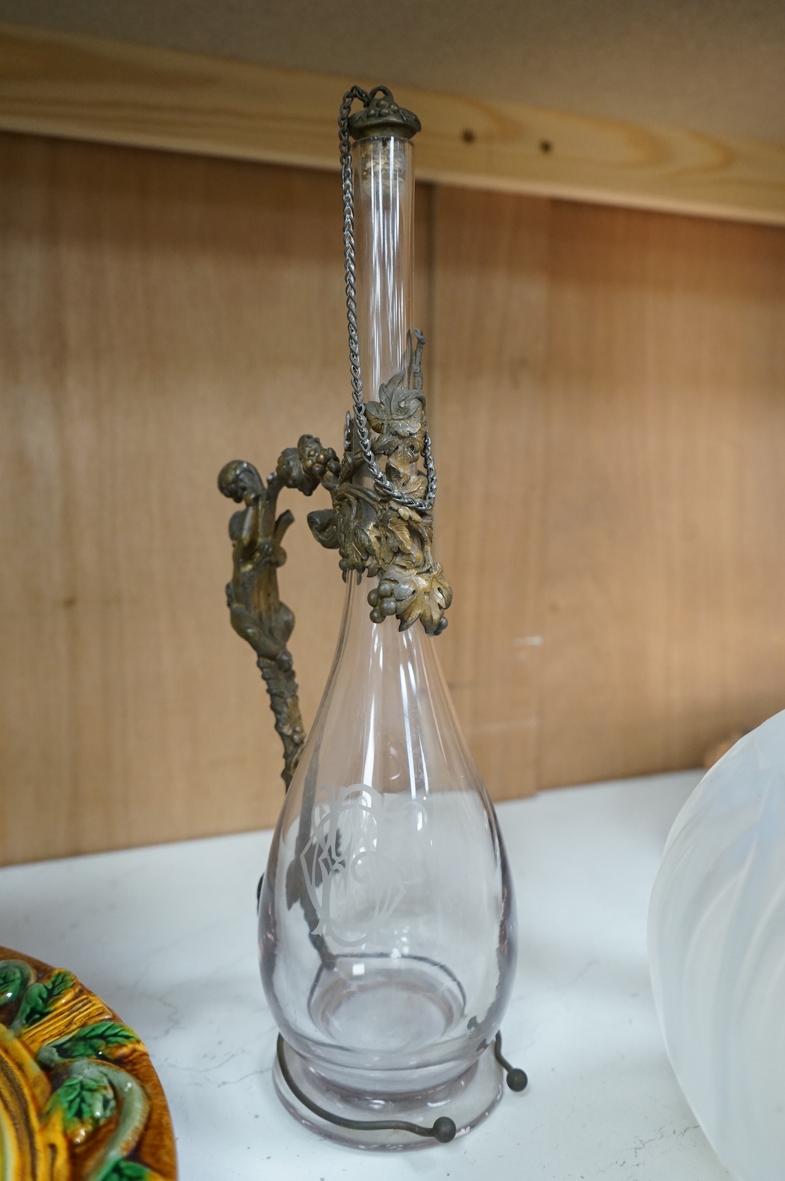 A glass decanter with bronzed metal mount, and a Sabino opaline glass vase, decanter 36cm high
